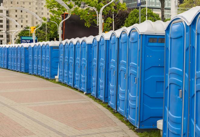 a row of portable restrooms at a fairground, offering visitors a clean and hassle-free experience in voorhees