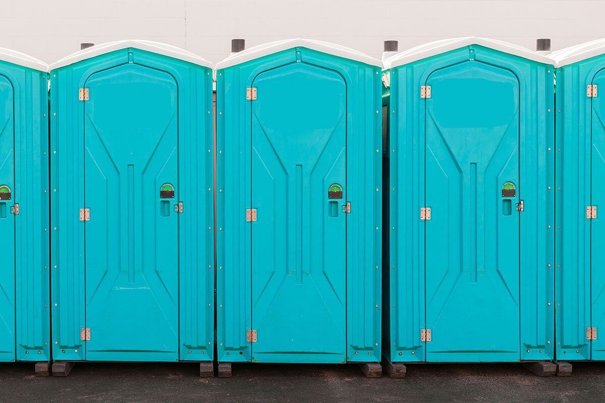 Industrial portable restroom units at a plant in Camden, New Jersey